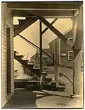 Photograph: Dockside Buildings with James U. Martin, c. early 1920s