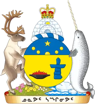 Coat of arms of Nunavut, featuring a stylized lit qulliq next to a blue inuksuk