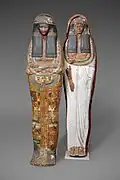 Yellow-painted mummiform lid and daily dress mummy board