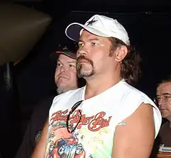 Singer Buddy Jewell, standing amongst a crowd.