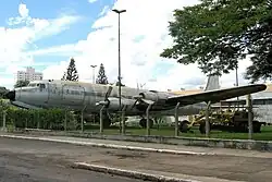 A large, weathered plane outdoors