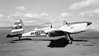 Grayscale photo of a monoplane