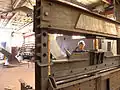 David Stromeyer at hydraulic press forming a section