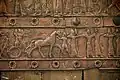 Detail of an embossed scene on bronze plate showing Shalmaneser III in a chariot and Assyrian archers. From a Balawat gate, Iraq, 859-824 BCE. Ancient Orient Museum, Istanbul
