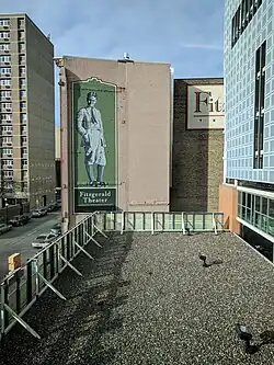Mural on building exterior depicting F. Scott Fitzgerald