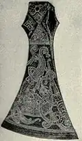 Silver adorned iron axe, probably a ceremonial weapon.