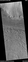 Part of lobate debris apron, as seen by HiRISE under HiWish program This lobate debris apron surrounds a mesa. Location is the Ismenius Lacus quadrangle.