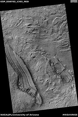 Tilted layers, as seen by HiRISE under HiWish program Location is Hellas quadrangle.