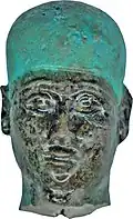 Head of Ptah; 664–525 BC; faience with blue-green and black glaze; height: 3.5&nbsp;cm, width: 2.1&nbsp;cm, depth: 3&nbsp;cm; Walters Art Museum (Baltimore, US