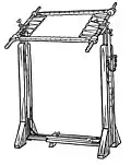 Free-standing embroidery frame with fabric attached