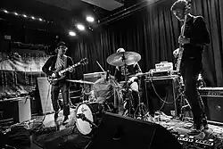 The band performing onstage