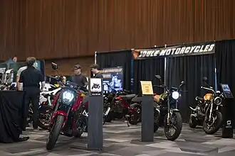 Electric motorcycles on display.