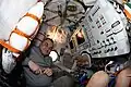 Ovchinin at the controls of Soyuz MS-26 in space during pre-departure fit checks