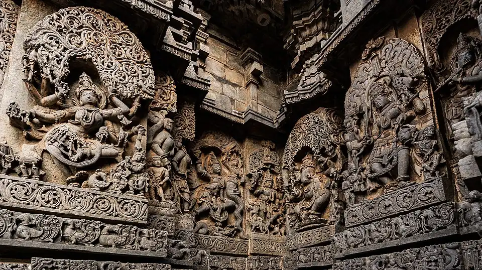 Exterior wall reliefs at Hoysaleshvara Temple. The temple was twice sacked and plundered by the Delhi Sultanate.[267]