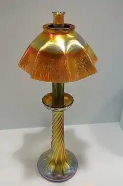 lamp with a shiny orange shade