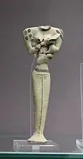 Figurine of a woman feeding a child and decorated to show jewellery or tattoos; clay; c. 5200&nbsp;– c. 4200 BC; Tell el-Muqayyar