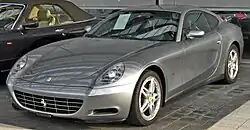 Front three-quarters view of a silver sports coupe