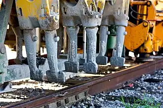 Ballast tamper