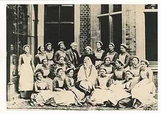Florence Nightingale in 1886 with the Nightingale Training School nurses.