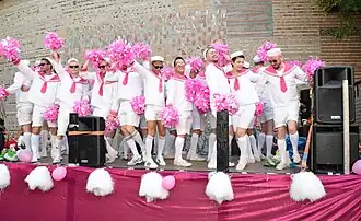 Marchers dressed in pink and white sailor suits during the 2016 parade.