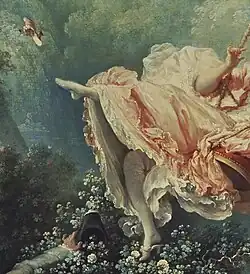 The mule flying from the woman's foot in Fragonard's Happy Accidents of the Swing (c. 1768)