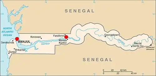 A map of The Gambia indicating the locations in the west and center where travellers may cross in order to arrive at Carabane