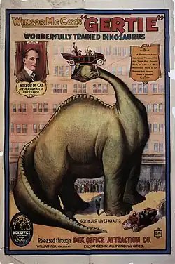 A color poster for an animated cartoon. A long-necked, four-legged dinosaur stands in the middle facing the audience. An automobile is balanced on the dinosaur's head.