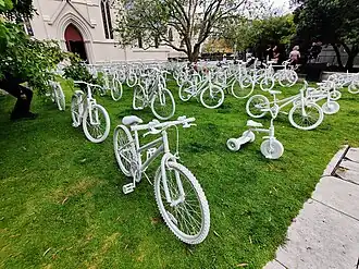 59 ghost bikes in Auckland: art installation by Bike Auckland marking World Day of Remembrance for Road Traffic Victims, 2024