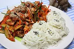 Golbaengi-muchim served with boiled somyeon