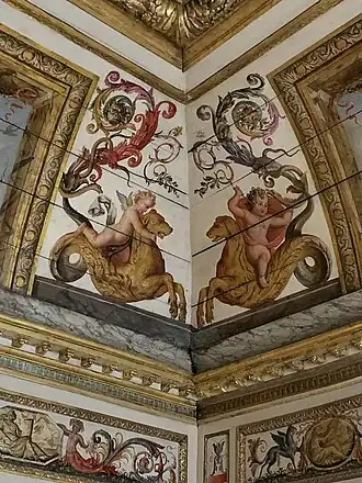 Baroque putti painted on the boiserie of a room from the Hôtel Colbert de Villacerf, now in the Musée Carnavalet, Paris, unknown architect, sculptor and painter, c. 1650[12]