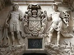 Hôtel de Clary: Apollo and Mercury above the entrance.