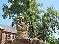Fontaine aux Abeilles (Fountain of the Bees) in Haguenau, Alsace (18th century.) The fountain was originally in the Cistercian convent of Neubourg at Dauendorf.