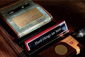 four objects on the Resolute desk including the Presidential call button