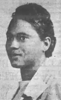 A Black woman, photographed in 3/4 profile