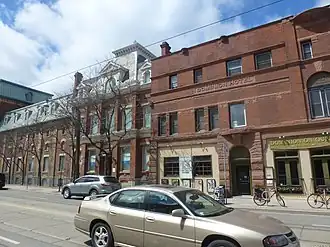 View of Trefann Court along Queen Street East, west of Sumach Street