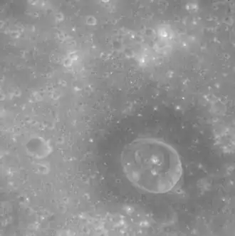 Closeup of crater with dark halo within the peak ring
