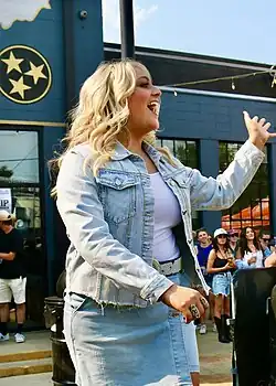 HunterGirl approaches the stage to perform at the 2025 19/Idol/BMG CMA Fest Takeover in Nashville, TN.