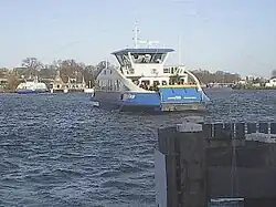 Ferry seen from De Ruijterkade.