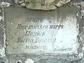 Inscription on the bottom of the sculpture.