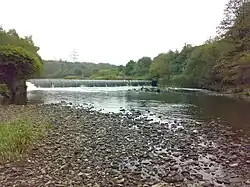 The weir across the River Irwell. Water was diverted to the left of this image.