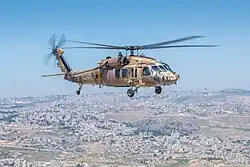 UH-60 Black Hawk of 124 Squadron "Rolling Sword" (red logo on tail) in April 2023