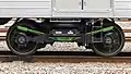 An S-DT67ef motor bogie on car KuMoHa 7203