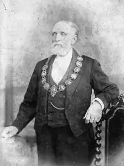 Portrait photo of James Gapes wearing mayoral chains