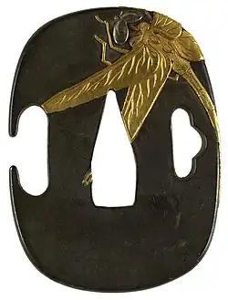Japanese tsuba with a dragonfly, 1931: Shibuichi with gold and silver, Walters Art Museum