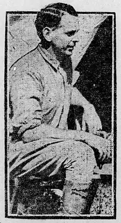 Black-and-white newspaper image of John C. Cockey, facing right, sitting