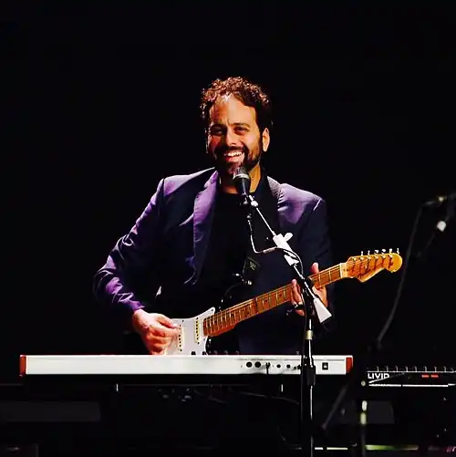 Jon Carin on stage.jpg