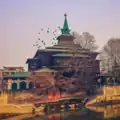 View of the Khanqah from the Jhelum river. On the bank saffron marks indicate the supposed existence of a Kali temple, although no conclusive evidence exists of the latter.