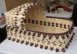 Black ash baby basket by Odawa-Ojibwe Kelly Church, Michigan