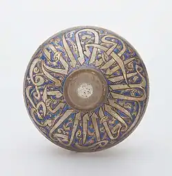 Mamluk enamelled flask. Its shoulder bears a wide band with a dedication to an unnamed sultan in thuluth. Egypt or Syria, first half of the 14th century. Khalili Collection of Islamic Art.