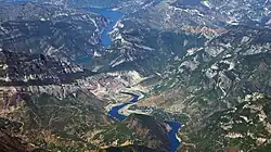 River Drin in the area of Koman, with the village, the dam and the lake